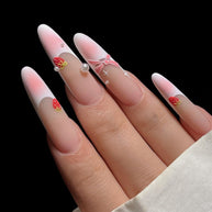 Matte extra-long stiletto nails with pink-nude gradient tips, decorated with hand-painted strawberries, bows, and pearls for a sweet, feminine vibe.
