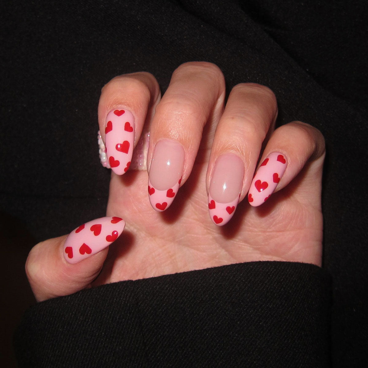 Glossy medium almond nails | baby pink + red hearts | sweet & flirty
