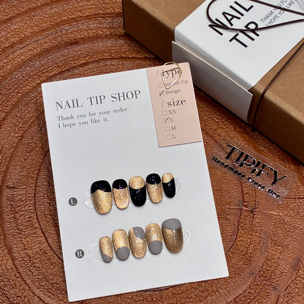 Warm Honey Taupe cat eye press-on nails with gold glitter accents and glossy finish