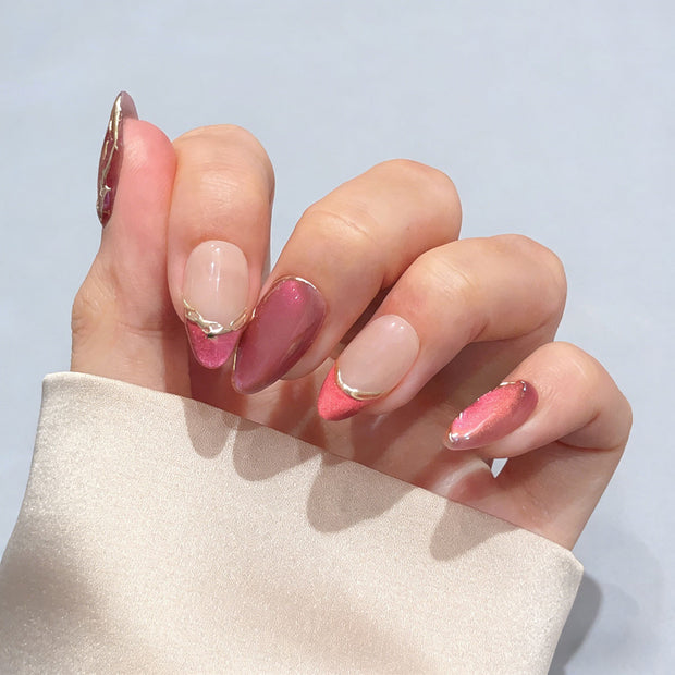 blush gild cat eye press on nails, gilded french accent fake nails, short almond shape acrylic nails, romantic date nail art, luxury handmade reusable nails, office party fake nails, 2026 trendy pink gold nails, women's daily wear cat eye nails