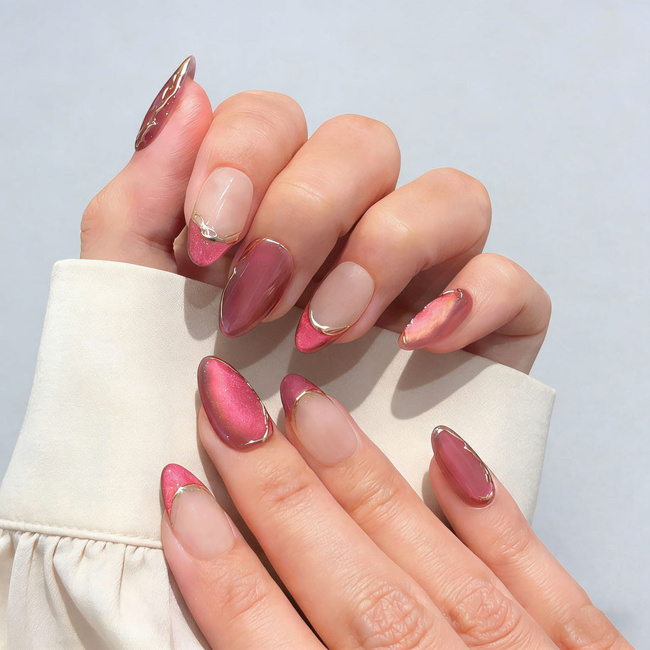 blush gild cat eye press on nails, gilded french accent fake nails, short almond shape acrylic nails, romantic date nail art, luxury handmade reusable nails, office party fake nails, 2026 trendy pink gold nails, women's daily wear cat eye nails